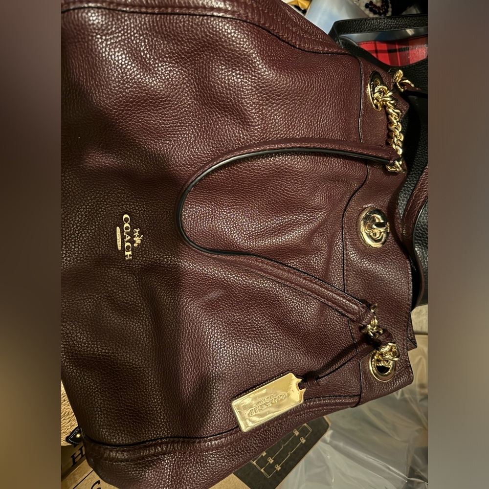 Beautiful burgundy Coach bag.